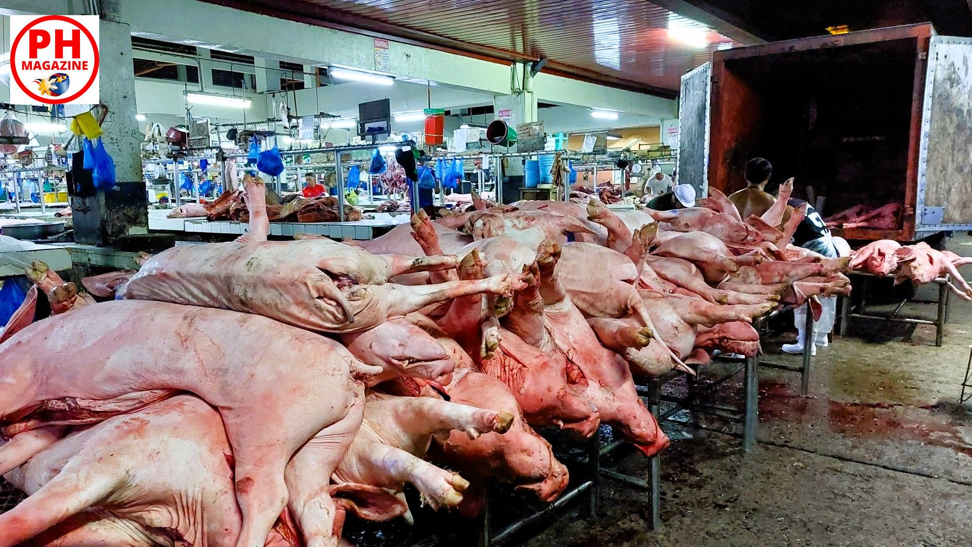 Photo of the Day for December 21, 2023 – Slaughtered pig delivery at public market Dumaguete